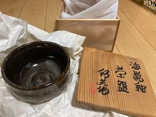 Black pottery with attached