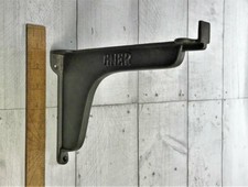 PAIR OF CAST IRON "GNER LIP"