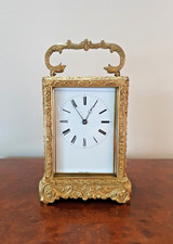 A FINE GILDED BELL STRIKING