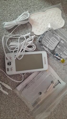 Tens machine used once - used, labour