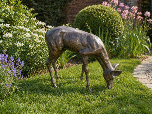 Bronze fawn baby - bronze, grazing
