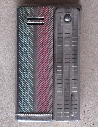 Old petrol cigarette lighter - old,
