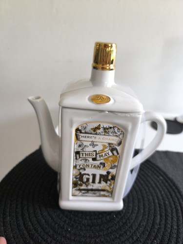 White ceramic teapot with - teapot,