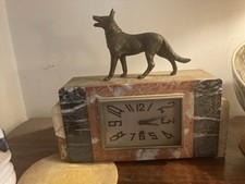 French Art Deco marble clock surmounted by wolf