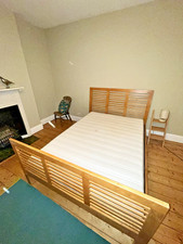 Wooden Sleigh-Style Double Bed