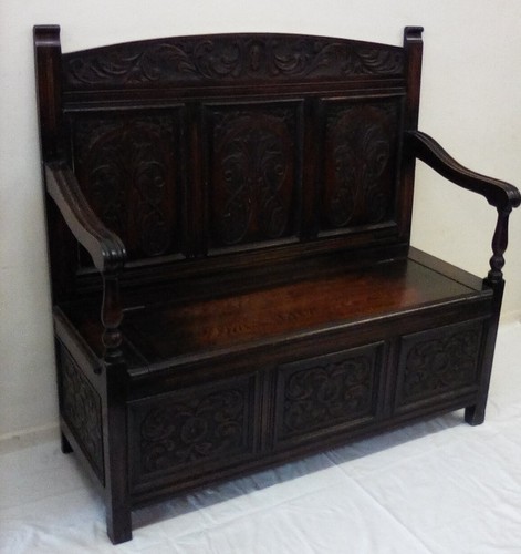 Carved oak bench settle - /,