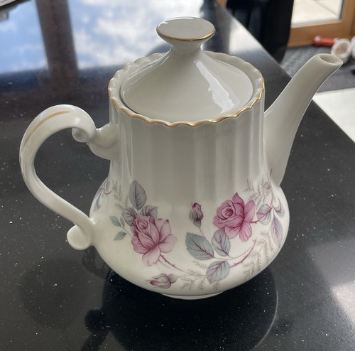 Vintage white teapot with - with, pink