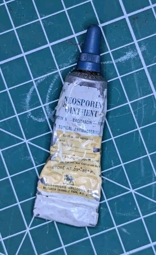 Vintage 1970s metal neosporin - metal,