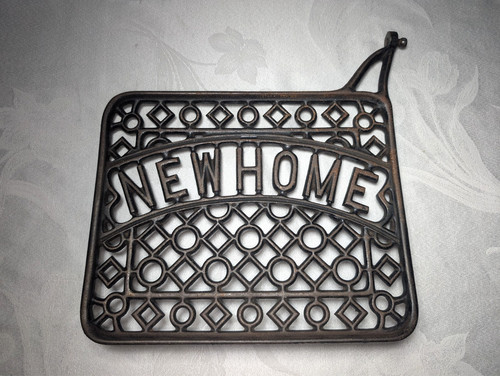Cast iron new home sewing - iron,