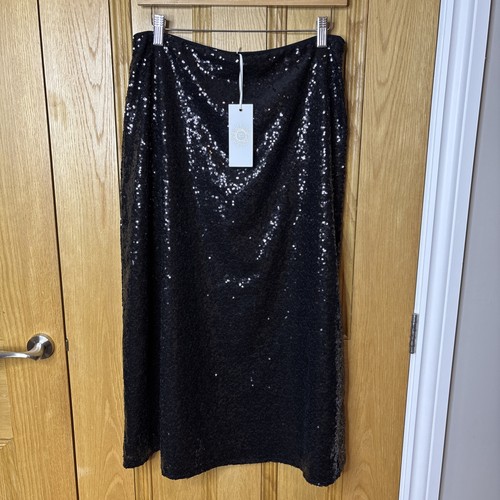 Feather and bone black sequin - feather,