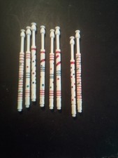 Eight decorated bovine bone