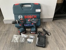 Bosch GSB 18v-55 & GDX 18v-200 + 2x5ah Batteries And Charger In Case