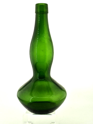 Emerald green glass bottle - glass,