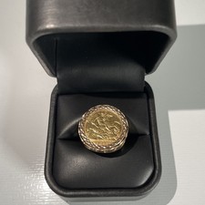 A 22ct gold 1894 half sovereign set in a 9ct ring -7.1 grams. 16mm ring hole