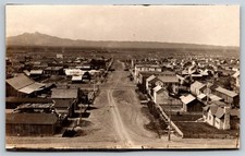 RPPC Wyoming Cody Aerial View HMD Lumber Yard Hart Mountain Inn Postcard, Y3