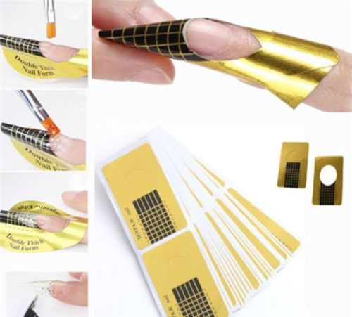 Gold nail forms self - forms,