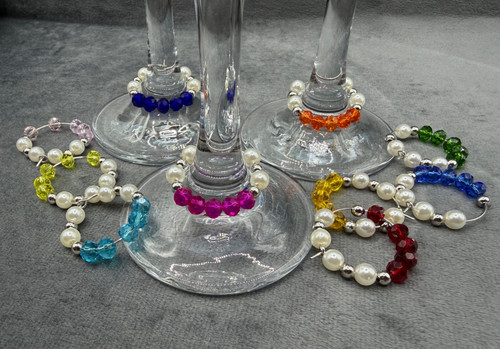 Ivory multicoloured round - &,