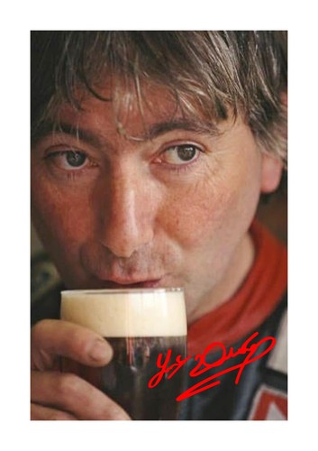 Joey dunlop with pint - 13, a