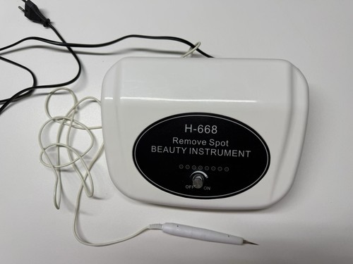 Electronic tattoo mole removal - tattoo,