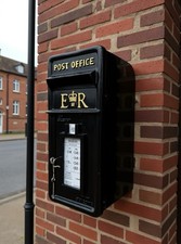 Cast iron post office red - post,