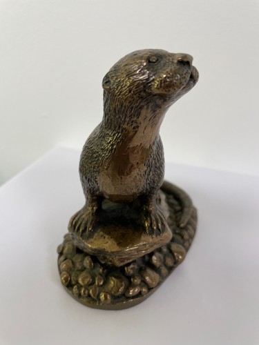 Bronze age hand cast - cast, otter