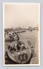 Old B&W Photo Boy in Wooden Rowing Boat on Boating Lake Holiday Fun