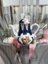 THE MINIATURE TEAPOT