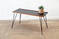 A TEAK AND STEEL MID CENTURY