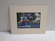 Photograph Of Women On A Hobie