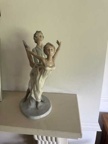 Nao lladro dancing a - by, on