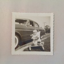 Vintage B&W Photograph Baby Parks Quadracycle Next to Car Median Beanie Race