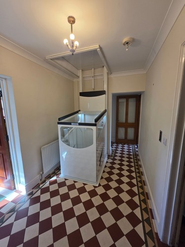 Through floor lift - through,