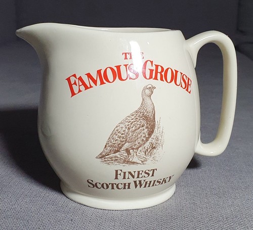 The famous grouse scotch - the,