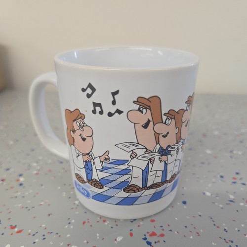 Vintage tetley tea mug folk - tea,