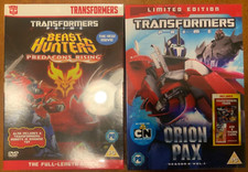 Transformers. 2x DVD Box sets. includes Toy . New Sealed. Great Stocking Filler