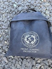 Caravan front towing cover