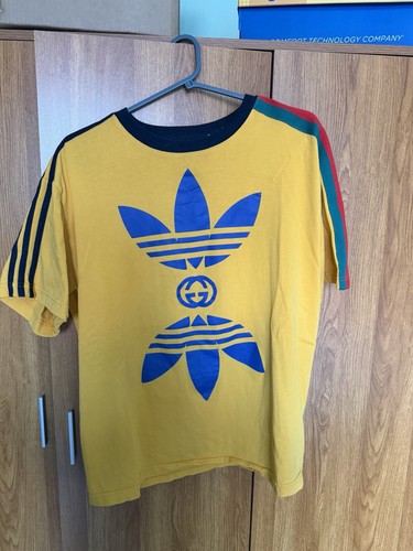 Gucci men yellow logo - gucci,