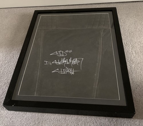 Framed hand signed leather - signed,