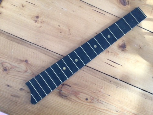 Vintage fancy parlor fretboard