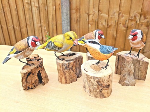 Hand carved painted goldfinch - hand,