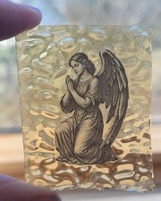 stained glass praying angel