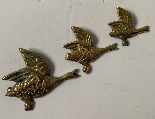 Vintage three brass flying - brass,