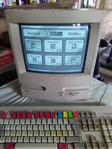 Amstrad pcw16 with - amstrad,