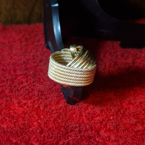 Gold tone woven knot - woven,