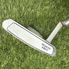 ODYSSEY WHITE HOT 2-BALL BLADE PUTTER WITH ORIGINAL GRIP. 35 INCHES LONG