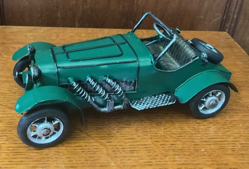Tin car not toy - "not, toy"