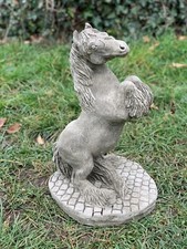 Prancing horse figurine Concrete horse sculpture Outdoor stallion statue Animal