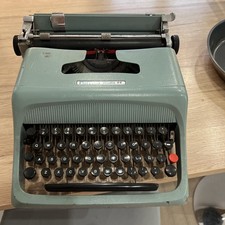 Vintage Olivetti Lettera 32 . Need to be repair. typewriter duckegg blue