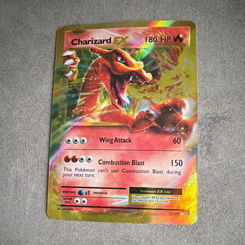The pokémon company charizard - pokémon,
