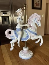 LLADRO STYLE~Paul Sebastian, sailor child on carousel horse figurine dated 1990